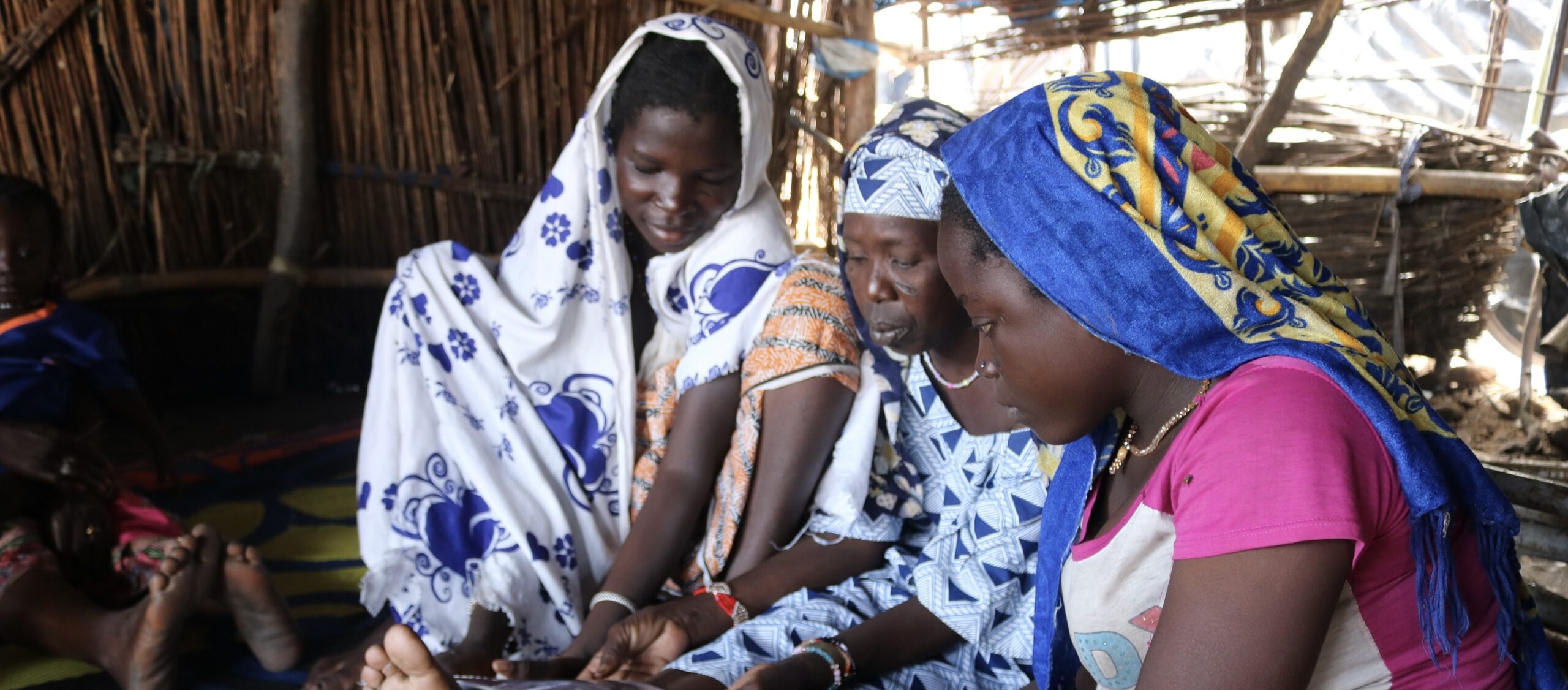 Women participate in an HIV/AIDS session at a site for internally displaced people in Mali’s capital, Bamako.