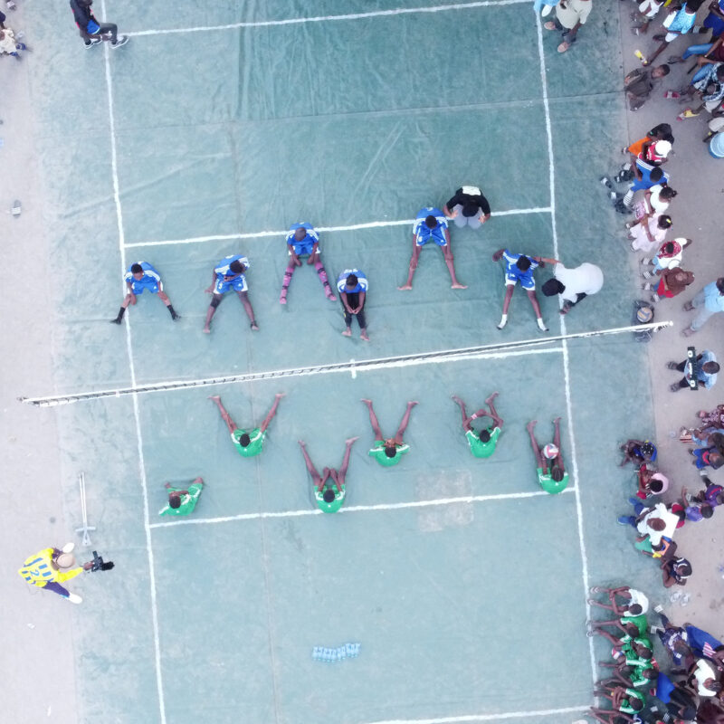 students on volleyball court in Senegal