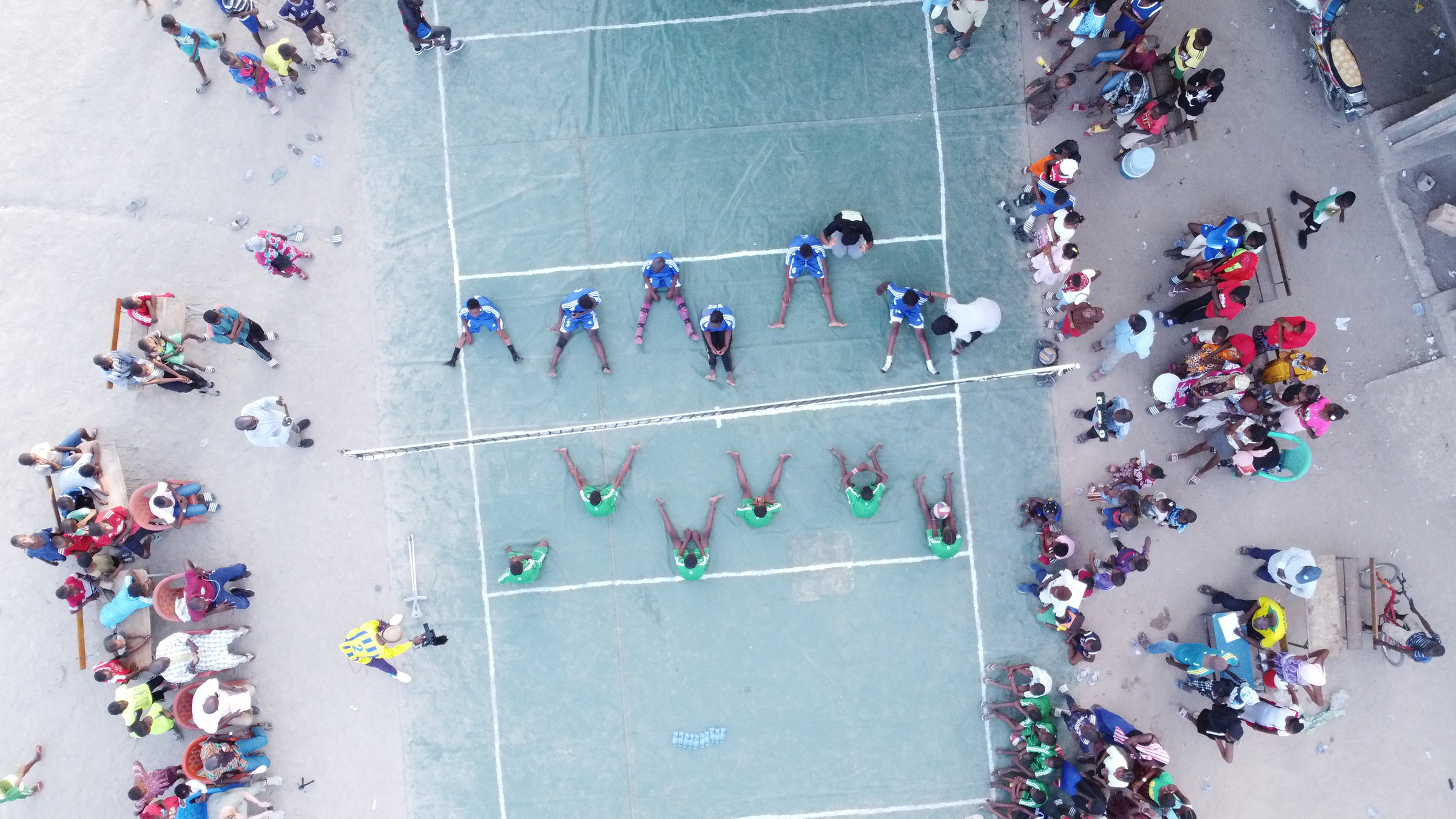 students on volleyball court in Senegal