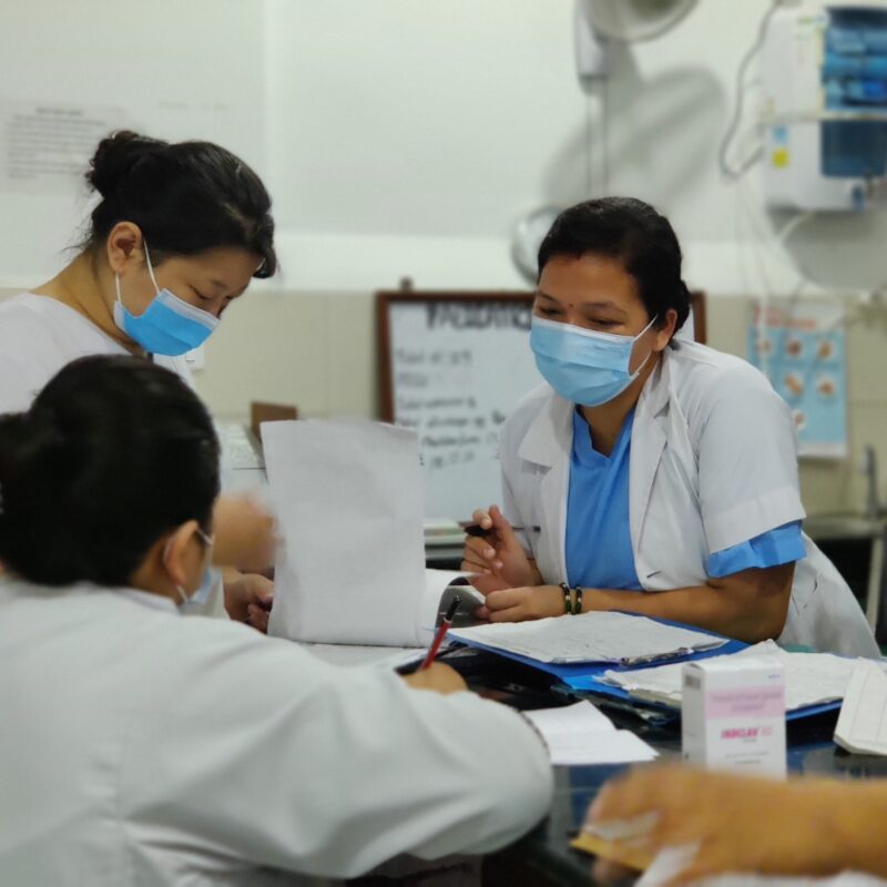 Workers talking with masks on in Viet Nam