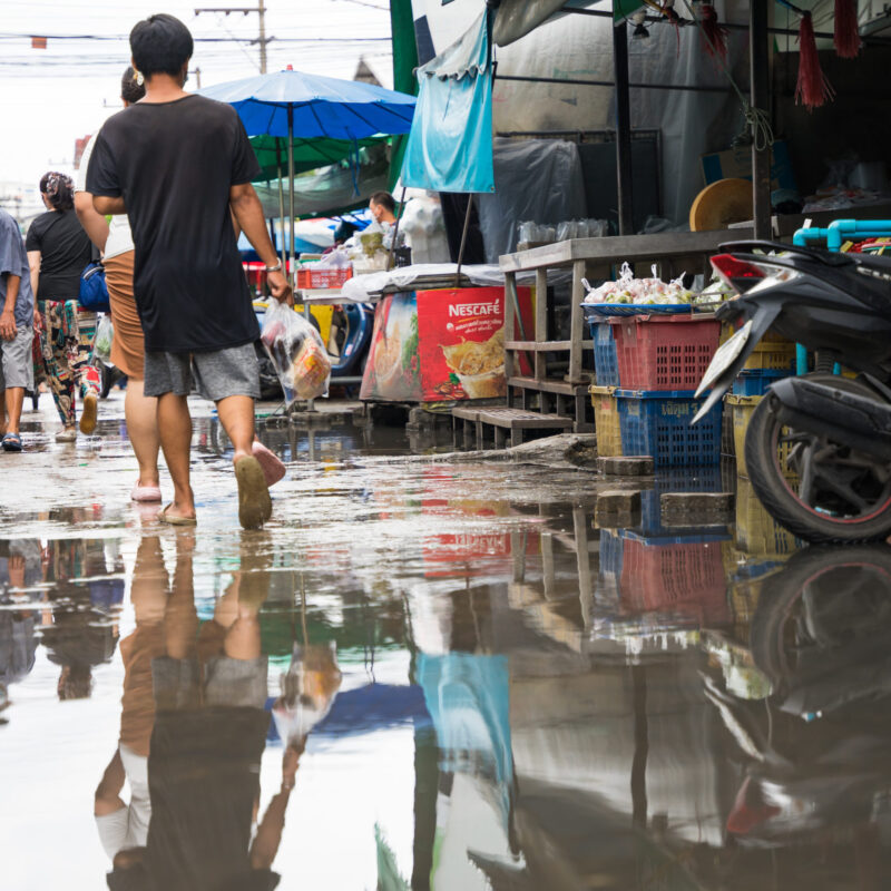 water puddle in outdoor market in Thailand