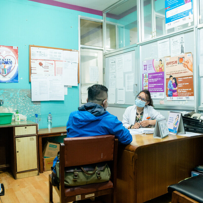 case manager counseling client in clinic