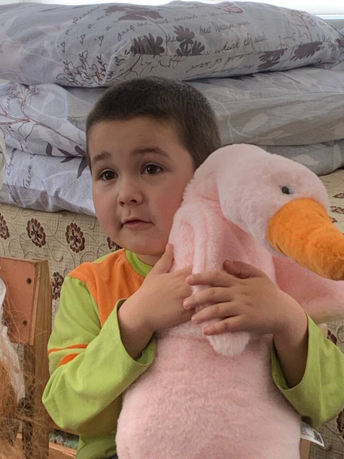 A student embraces the Hugging Goose. Photo credit: Olena Smyrnova