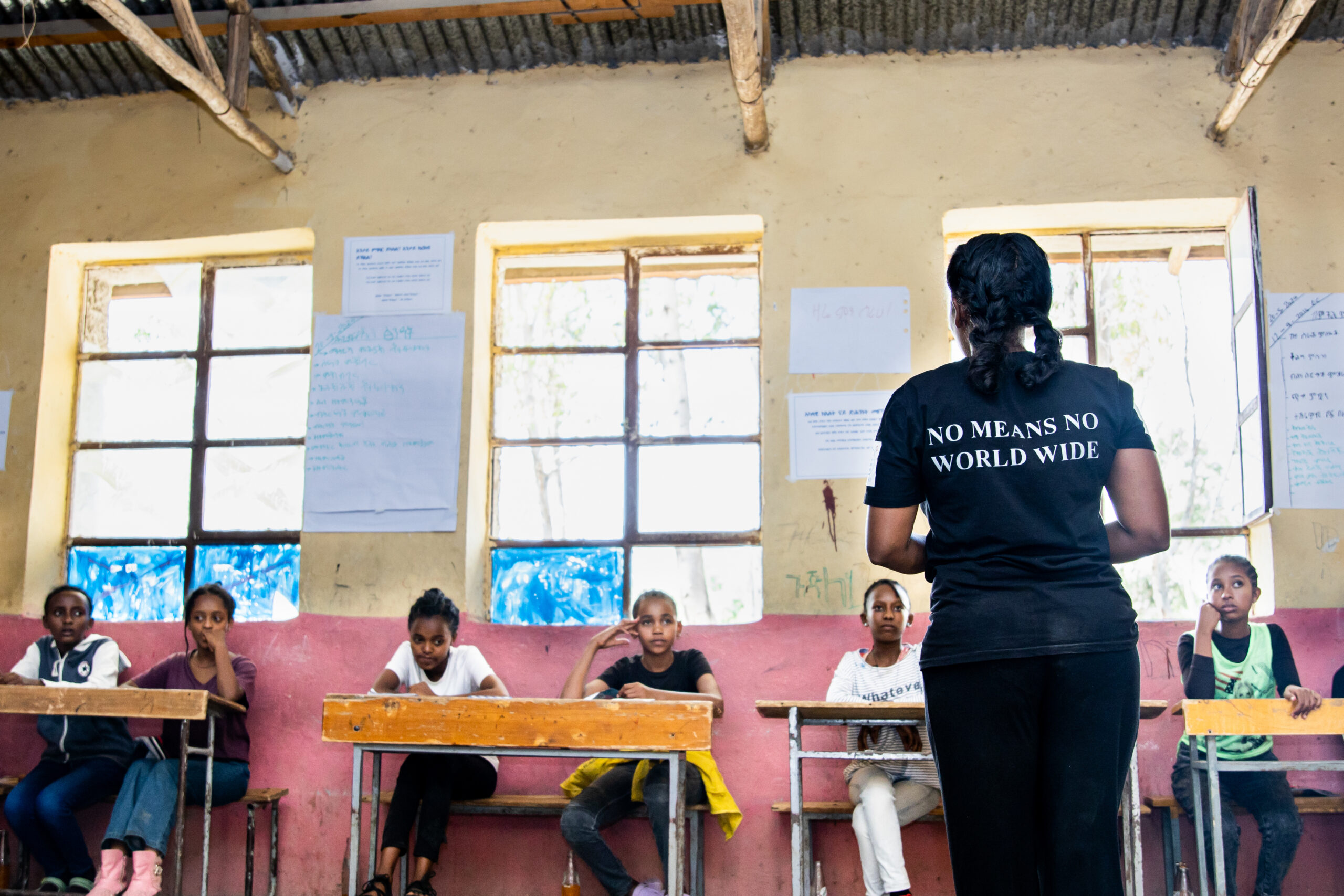 Instructor trained to use the No means No Worldwide intervention talking to a classroom of girls.