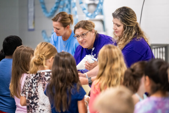 Teachers interact with students