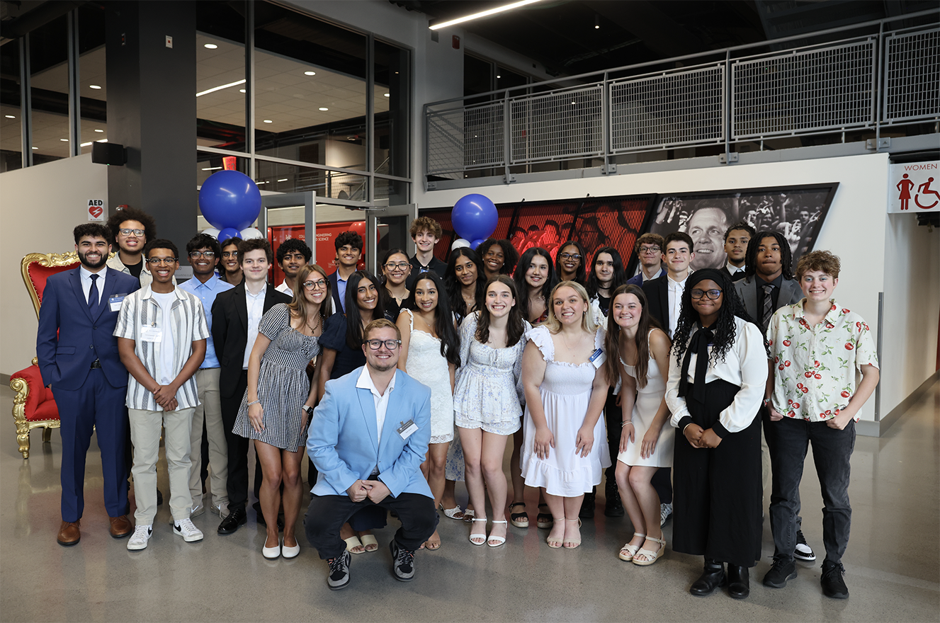 A group of academy participants during their graduation ceremony.