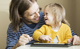 Man with girl and tablet